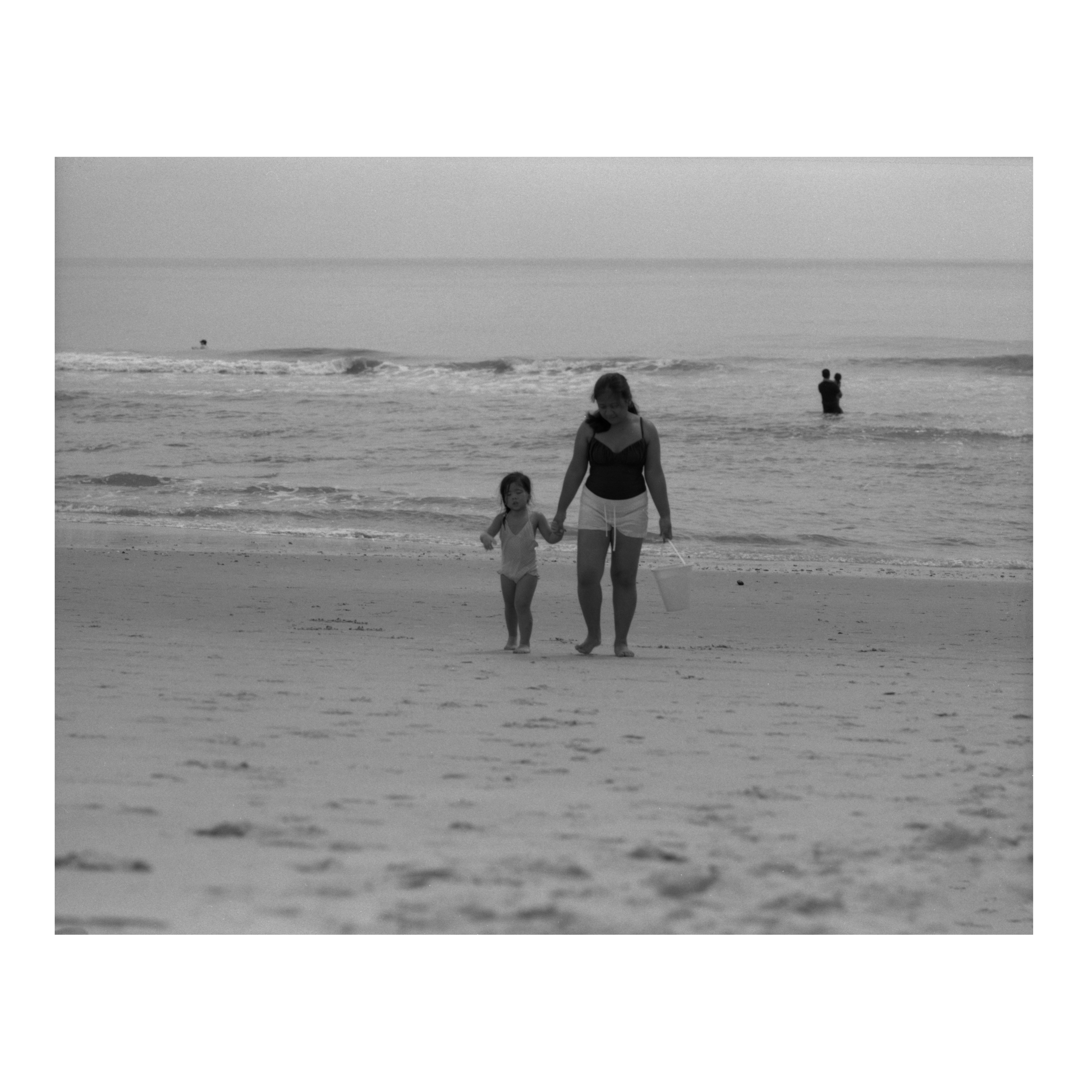 Mother-Daughter in a beach
